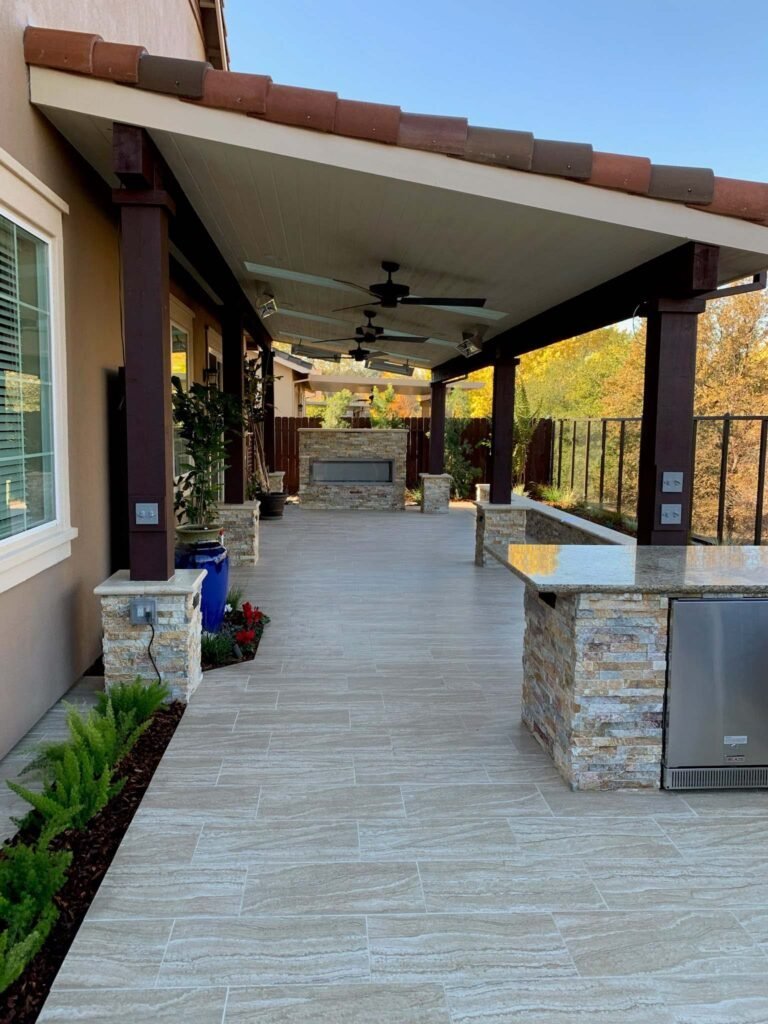 Landscaped backyard with patio and planting