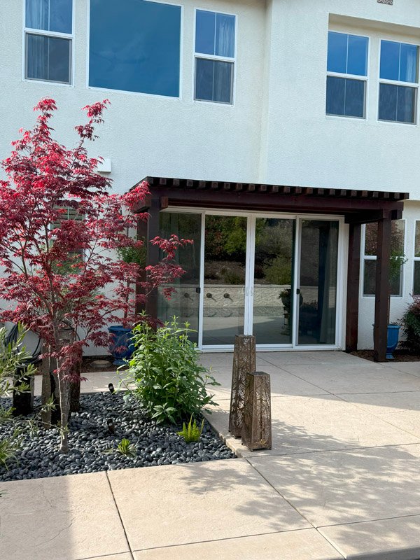 South Canyon Construction creates modern patio entrance with beautiful landscaping